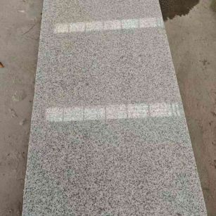 孝感芝麻白光面毛板